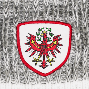 Kultbeanie Tirol Adler hellgrau