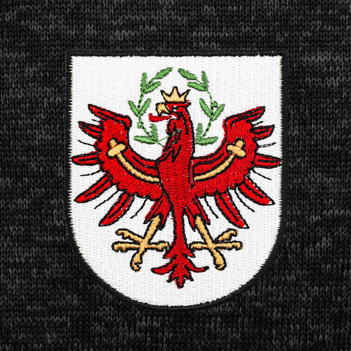 Tirol Kultjacke mit Kapuze - Schwarz
